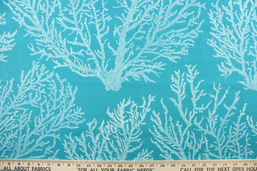This fabric features white seacoral on a turquoise background and is perfect for any project where the fabric will be exposed to the weather. 