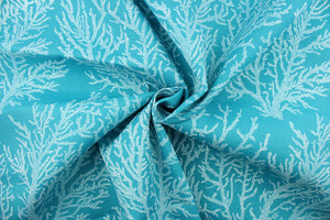 This fabric features white seacoral on a turquoise background and is perfect for any project where the fabric will be exposed to the weather. 