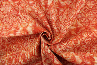 This fabric features interlocking geometric diamonds in orange and is perfect for any project where the fabric will be exposed to the weather. 