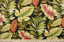 Load image into Gallery viewer, This fabric features a large leaf design on a black background and is perfect for any project where the fabric will be exposed to the weather. Colors include red, green, brown and khaki.

