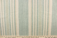 Load image into Gallery viewer, This cotton blend fabric features pale green and khaki stripes stripes set against a light beige background.  
