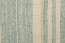 Load image into Gallery viewer, This cotton blend fabric features pale green and khaki stripes stripes set against a light beige background.  
