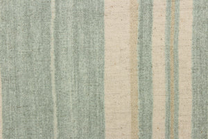 This cotton blend fabric features pale green and khaki stripes stripes set against a light beige background.  