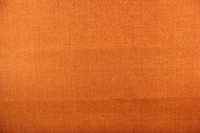 This solid orange fabric is perfect for any project where the fabric will be exposed to the weather.  