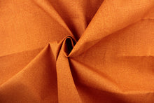 Load image into Gallery viewer, This solid orange fabric is perfect for any project where the fabric will be exposed to the weather.  
