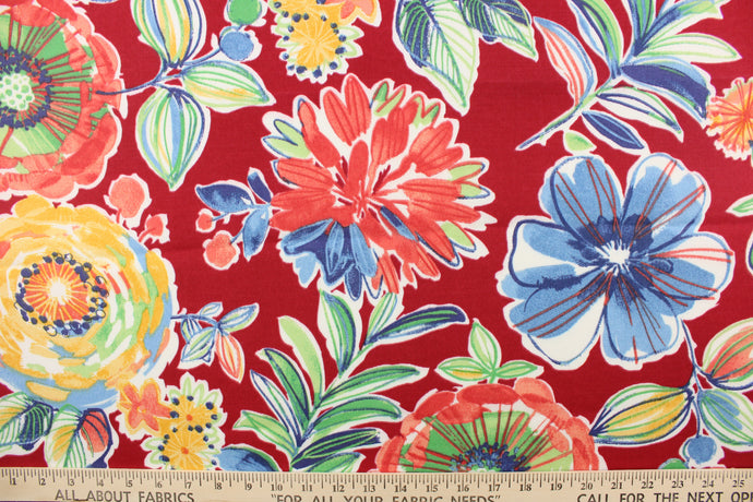 This screen printed fabric features large colorful flowers set against a solid background and is perfect for any project where the fabric will be exposed to the weather.  Colors include red, coral, yellow, orange, blue, green, grey, and white.