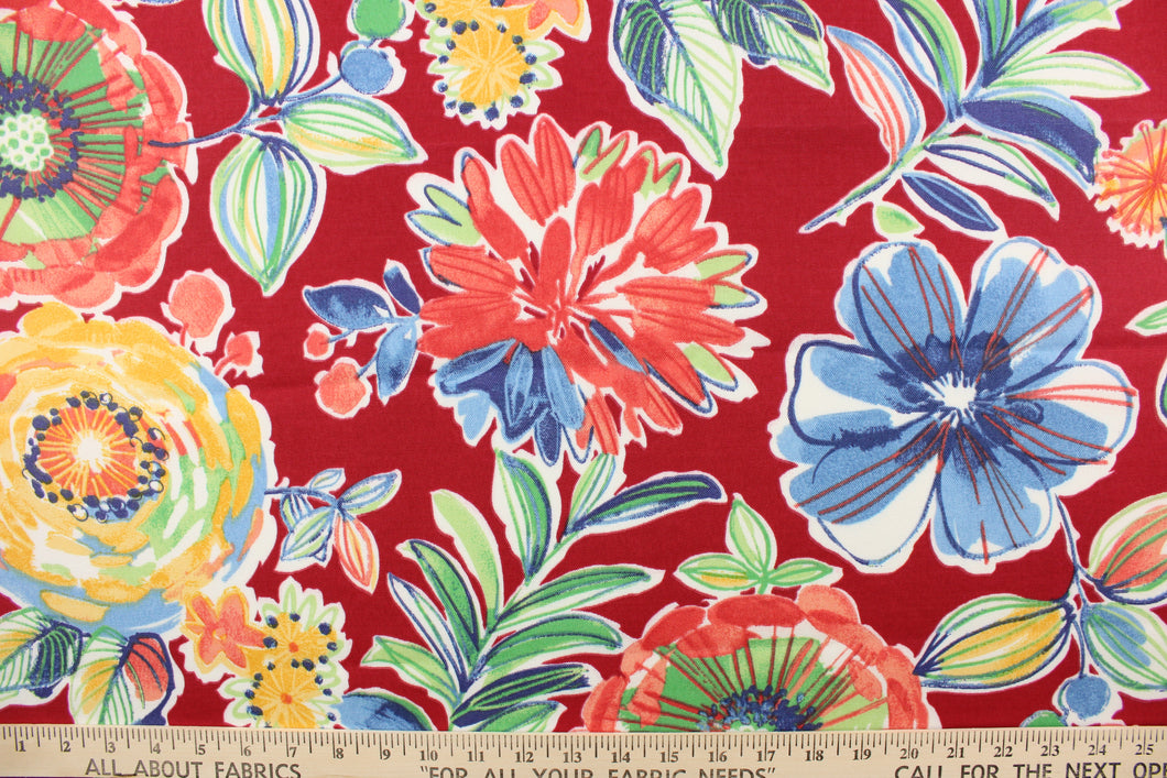 This screen printed fabric features large colorful flowers set against a solid background and is perfect for any project where the fabric will be exposed to the weather.  Colors include red, coral, yellow, orange, blue, green, grey, and white.
