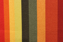 Load image into Gallery viewer, This heavy striped fabric in autumnal colors is perfect for any project where the fabric will be exposed to the weather. Colors include shades of red, orange, yellow and green.

