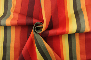 This heavy striped fabric in autumnal colors is perfect for any project where the fabric will be exposed to the weather. Colors include shades of red, orange, yellow and green.
