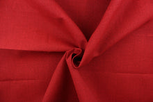 Load image into Gallery viewer, This solid red fabric is perfect for any project where the fabric will be exposed to the weather.
