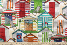 Load image into Gallery viewer, This fabric features small multi color beach huts nestled together near the ocean.  Colors include orange, turquoise, green, yellow, tan and white.
