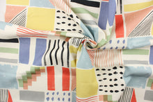 Load image into Gallery viewer, This fabric features a unique design in the colors of rose, gray, blue, black, red, mustard yellow and black set against a white background. 
