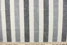 Load image into Gallery viewer, This outdoor fabric features stripes in black, gray and white. 

