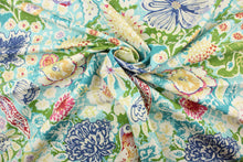 Load image into Gallery viewer, This fabric features a novelty bird and floral print on a light aqua blue background.  Colors included are teal, blue, green and red.
