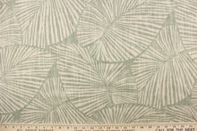 Load image into Gallery viewer, This pattern features large tropical leaves in sage green on a natural linen background

