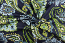 Load image into Gallery viewer, This fabric features a floral paisley design in shades of blue, green, off white and a yellowish green against a navy background.
