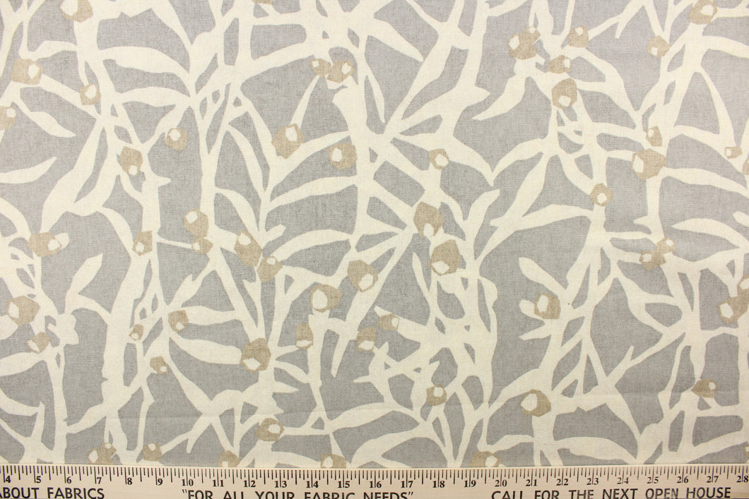 This fabric features a branch design in off white, and beige against a gray background. 