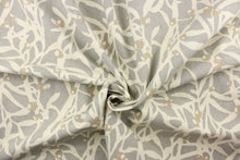 Load image into Gallery viewer, This fabric features a branch design in off white, and beige against a gray background. 
