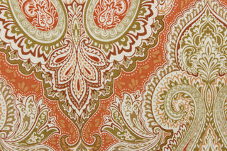 : This fabric features an damask design in varying shades of orange, taupe, white, and khaki