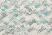 Load image into Gallery viewer, This fabric features a chevron design in grays, white, seafoam green, and teal blue .
