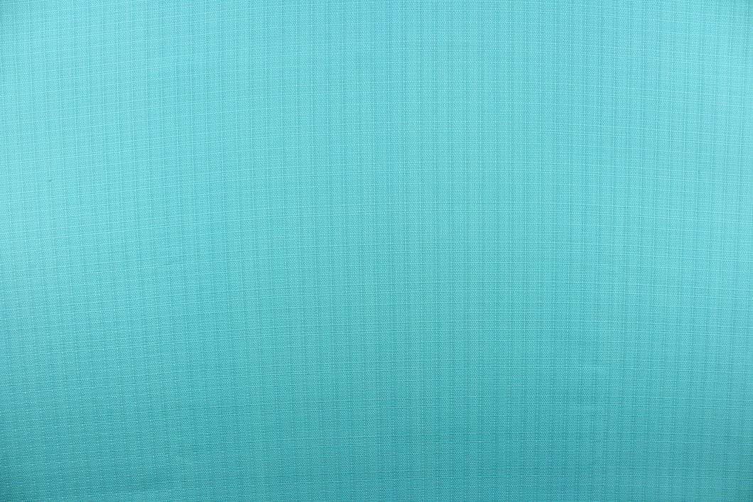  Mock linen in a solid turquoise blue.