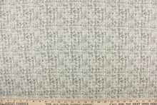 Load image into Gallery viewer, This fabric has a unique design in varying shades of gray and white. This fabric has a distress look to it. 
