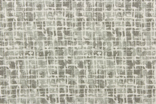 This fabric has a unique design in varying shades of gray and white. This fabric has a distress look to it. 