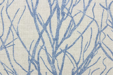Load image into Gallery viewer, This fabric features a branch design in blue against a pale gray background.
