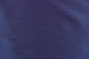 This taffeta fabric is in an iridescent blueish purple
