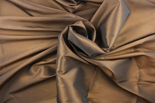 This taffeta fabric in a iridescent dark khaki. 