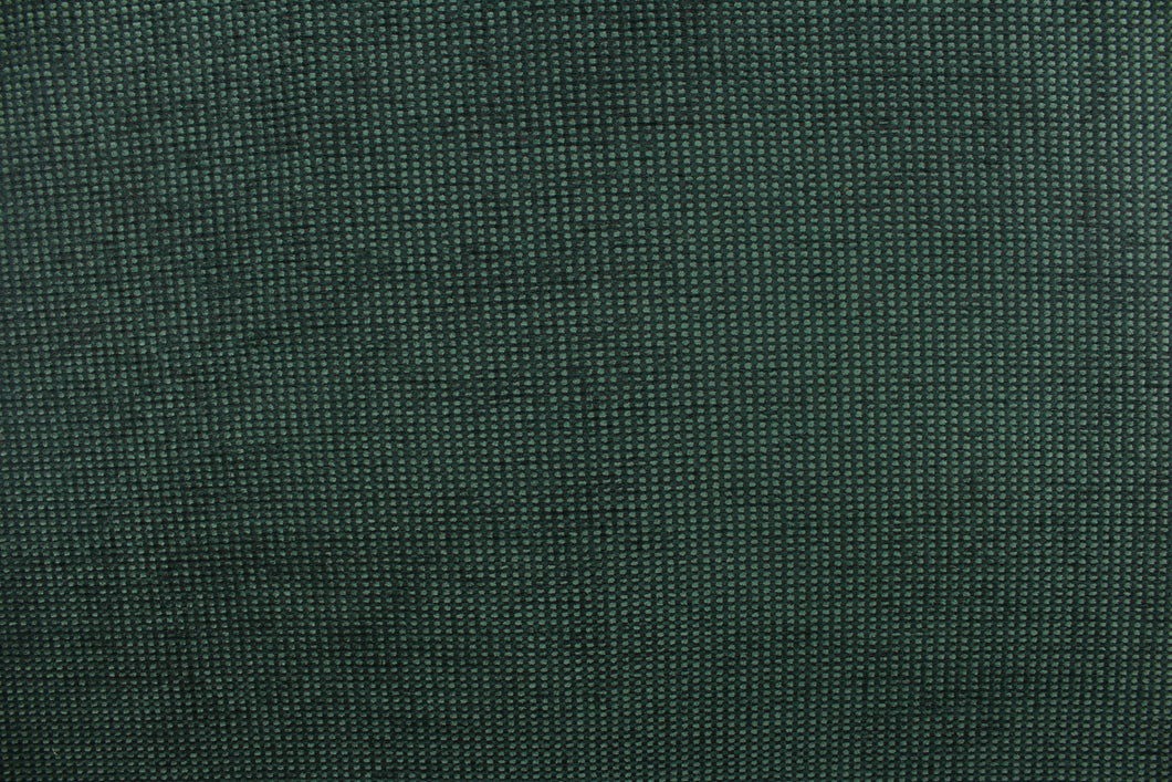 This duotone, hard wearing, textured chenille fabric in green with black accents would be a beautiful accent to your home decor.