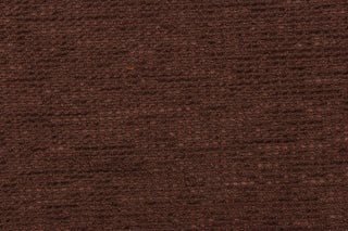 This hard wearing, textured chenille fabric in brown would be a beautiful accent to your home decor. 