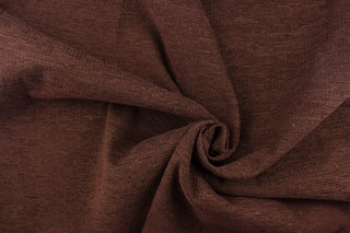 This hard wearing, textured chenille fabric in brown would be a beautiful accent to your home decor. 