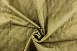 This quilted fabric design in olive green is durable and hard wearing and would be great for multi-purpose upholstery, bedding, cornice boards, accent pillows and drapery.  The possibilities are endless.