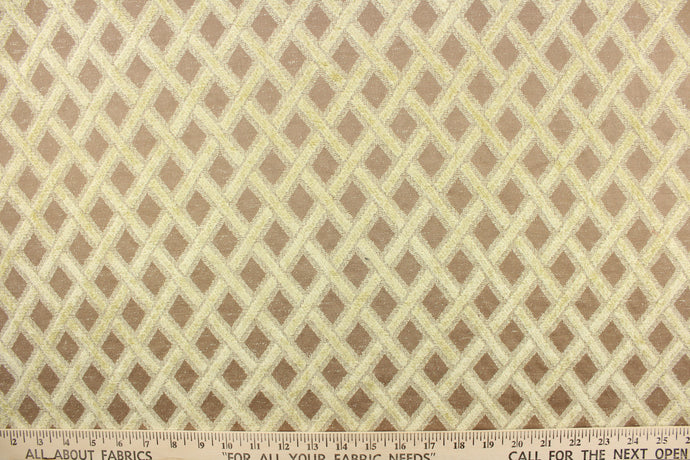 This hard wearing, textured chenille fabric features a lattice design in taupe and beige and would be a beautiful accent to your home decor. 
