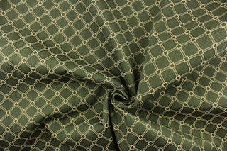 This jacquard features a geometric design in beige on a jade background.   It is clean and crisp and would work well for draperies, curtains, cornice boards, pillows, cushions, bedding, headboards and furniture upholstery.  It is stain- resistant and durable with a rating of 15,000 double rubs.