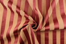 Load image into Gallery viewer, This stunning yarn dyed fabric features a striped pattern in crimson and coral.  Enhancing the colors of the stripes is a slight sheen.  This fabric would enrich any room whether you use it for drapery or an accent chair.  It is also perfect for throw pillows, home décor, duvet covers and apparel.  The possibilities are endless. 
