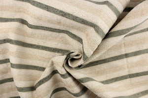 This hard wearing, textured chenille fabric features stripes in beige, khaki  and green. 