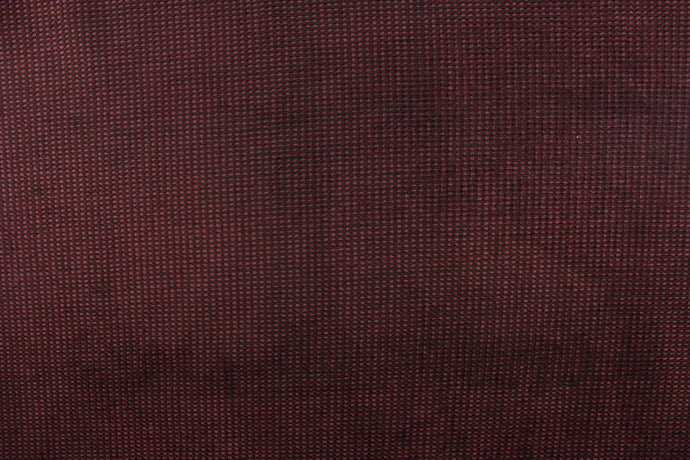 This duotone hard wearing, textured chenille fabric in burgundy with black accents would be a beautiful accent to your home decor.