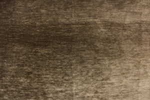 This hard wearing, textured chenille fabric in moss brown is water and stain resistant and would be great for high traffic areas.