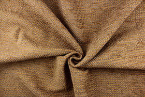This hard wearing, textured chenille fabric in tan and light brown would be a beautiful accent to your home decor. 
