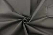 Load image into Gallery viewer, Twill fabric in a solid gray.
