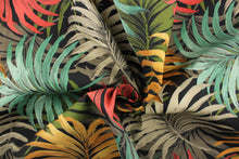 Load image into Gallery viewer, : This outdoor fabric features a leave design in golden yellow, green, gray and red against black.
