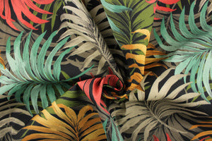 : This outdoor fabric features a leave design in golden yellow, green, gray and red against black.