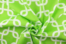 Load image into Gallery viewer, This outdoor fabric features a chain link design in white against a bright green .
