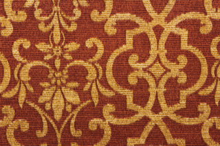 This outdoor fabric features an enteric design in golden brown against a rust red .