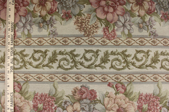 This elegant tapestry fabric features a large floral print design that is woven into the fabric.  The intricate pattern won’t fade with uses making it great for upholstery projects and more.   Colors included are pink, green, blue and cream.