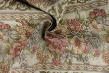 Load image into Gallery viewer, This elegant tapestry fabric features a large floral print design that is woven into the fabric. The intricate pattern won’t fade with uses making it great for upholstery projects and more. Colors included are pink, green, blue and cream.
