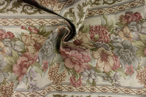 This elegant tapestry fabric features a large floral print design that is woven into the fabric. The intricate pattern won’t fade with uses making it great for upholstery projects and more. Colors included are pink, green, blue and cream.