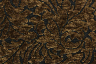 This hard wearing, textured chenille fabric features a unique leaf design in bronze on a black background.  